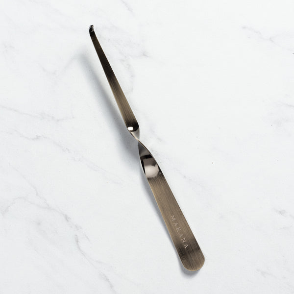 Makana brass candle wick dipper 